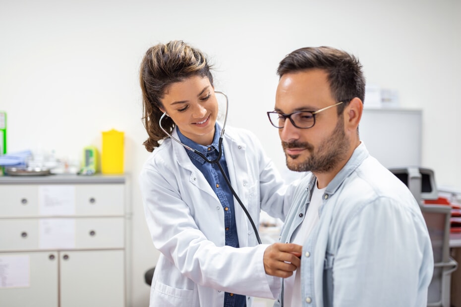 Female doctor with male patient